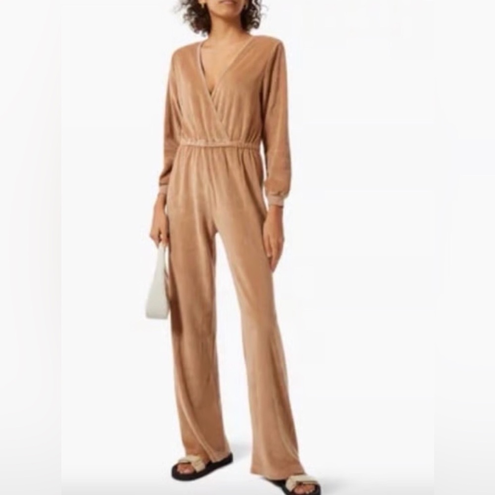 Suzi Kondi Cream Velour Jumpsuit with Deep V Neckline.